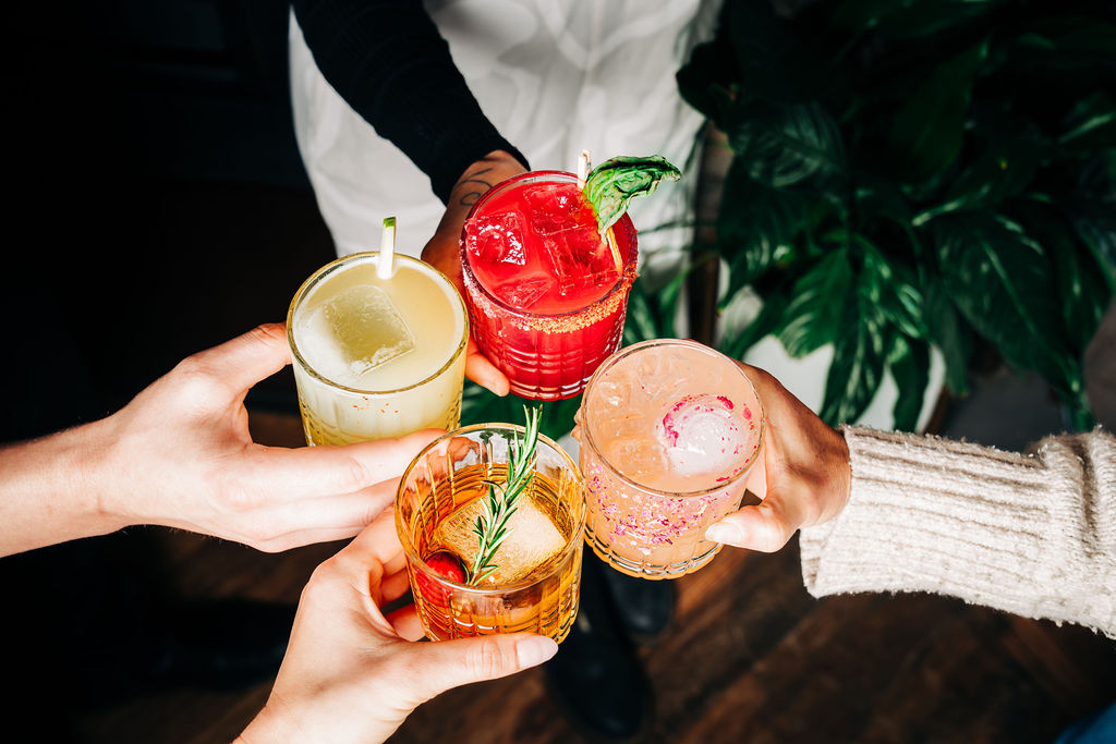 Guests toast over a family-style catering table at Stone House Nevada City
