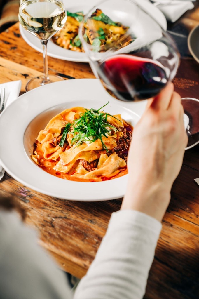 Pappardelle pasta with ragu and scallions at Stone House catering