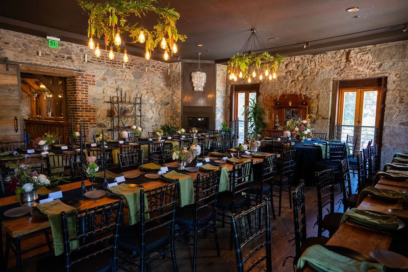 The Lounge at Stone House Nevada City — relaxed pre-ceremony lounge space with original 1857 stonework and modern seating