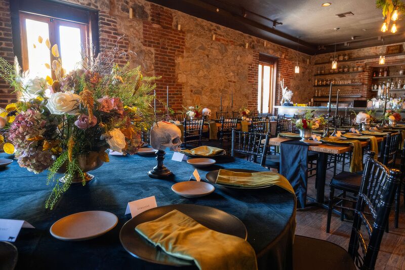Wedding gathering in The Lounge at Stone House Nevada City — second-floor reception space with elegant lighting