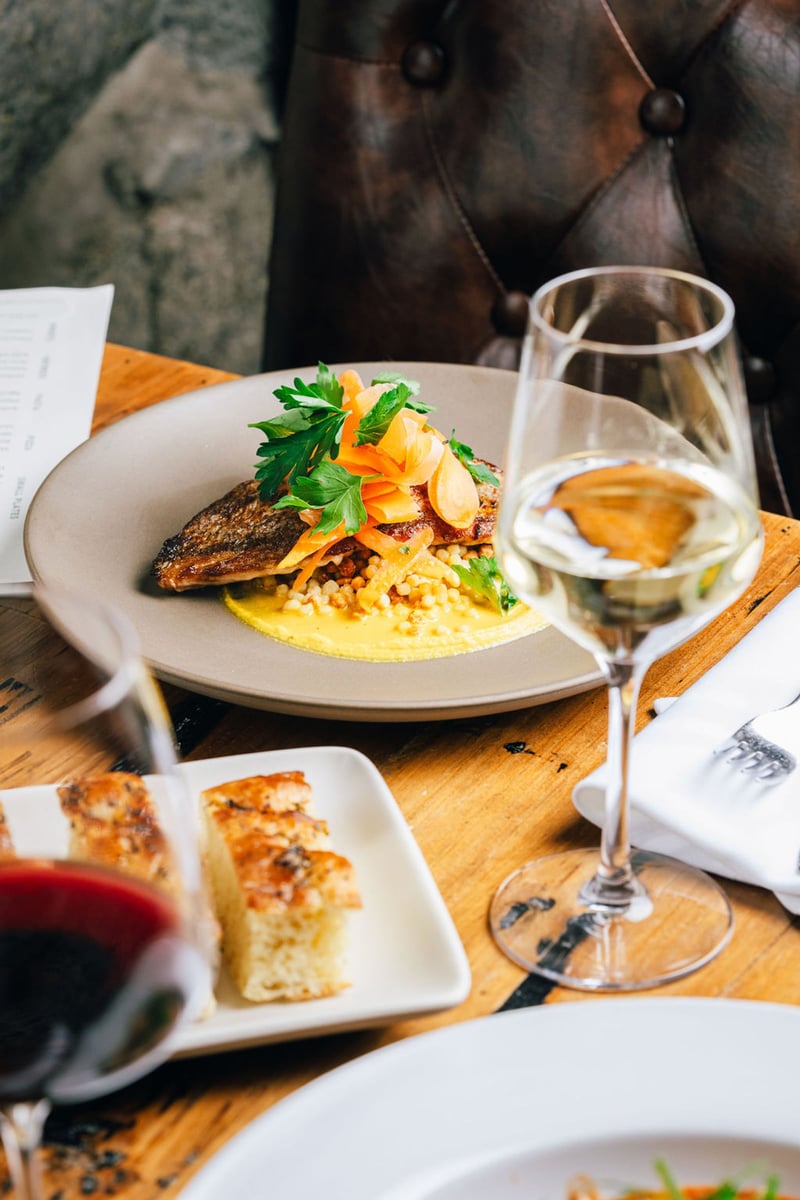Pan-seared fish over couscous with rustic focaccia — Prospector package at Stone House Nevada City