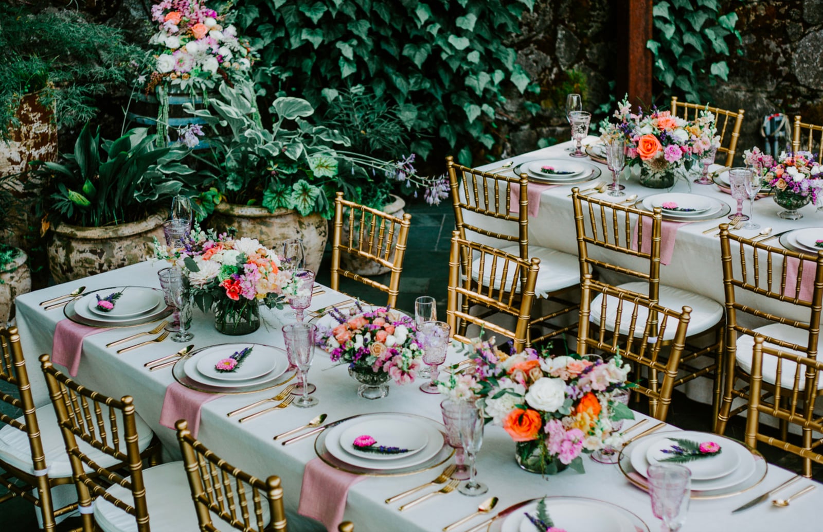 Styled wedding couple portrait at Stone House Nevada City — historic 1857 venue with original stonework as ceremony backdrop